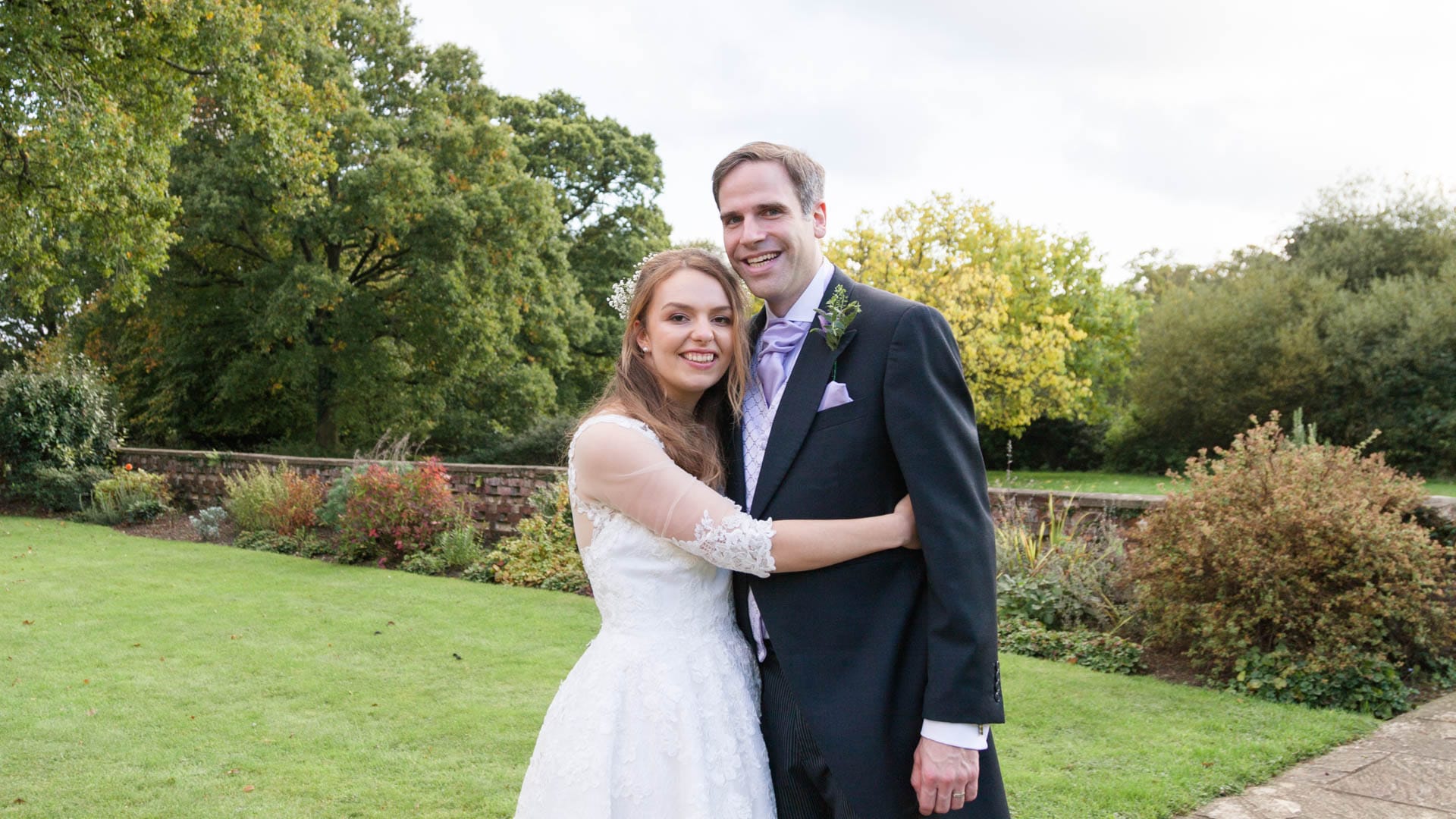 Laura embraces  James on their wedding day