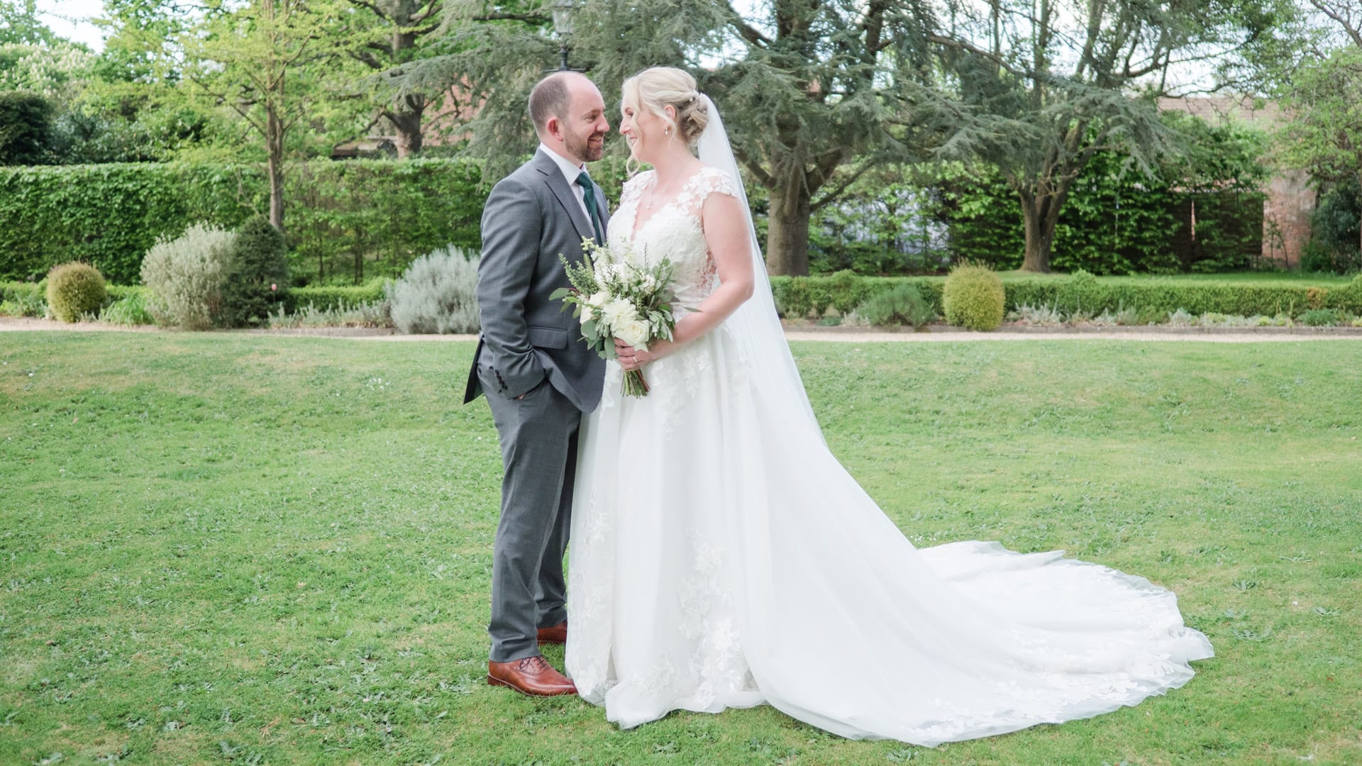Bride and groom on the lawn at Carey's Manor